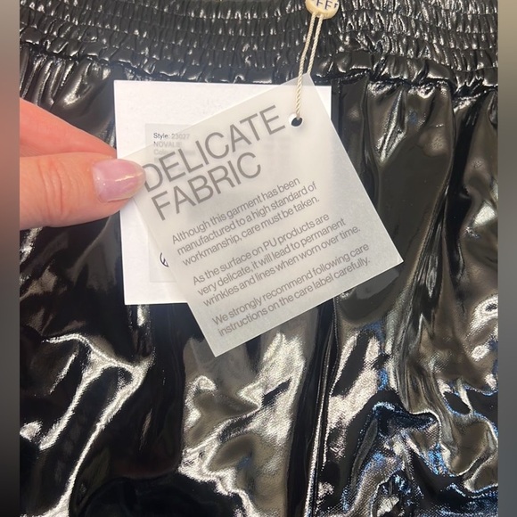 Scandinavian Baum und Pferdgarten Glossy Black shorts with Reflective Sheen - Picture 4 of 9